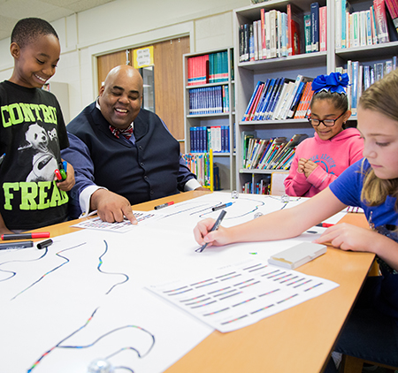 Dr. Marcus Nelson in a classroom