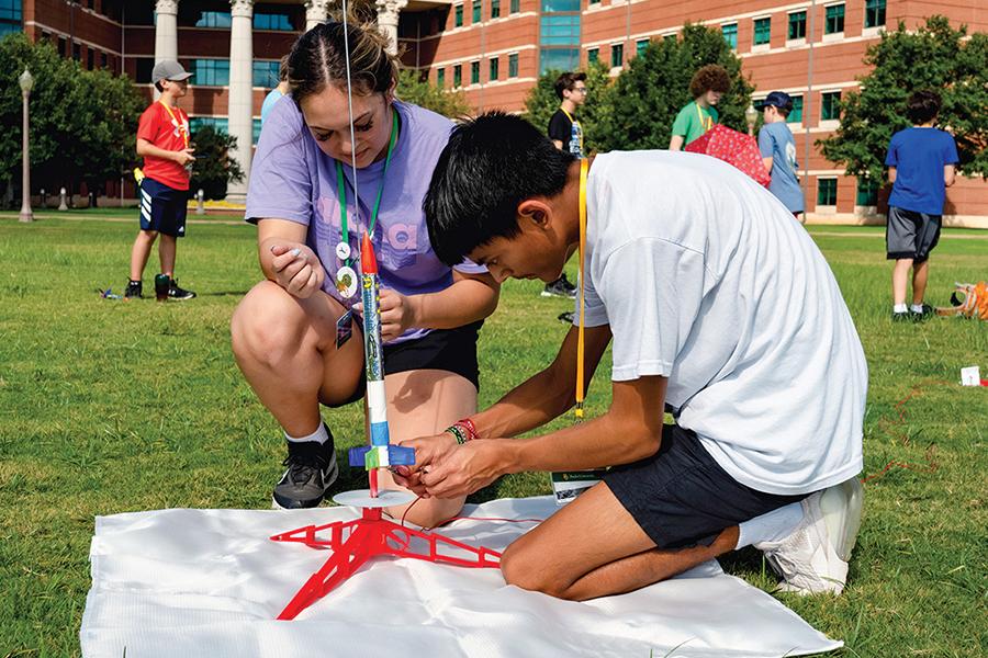 Students launch rockets they made at Baylor TIP camp